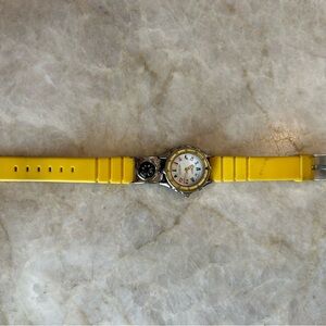 Old Navy yellow watch with nautical flag symbols representing numbers